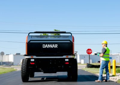 DANNAR 400 pictured with operator at a street sign